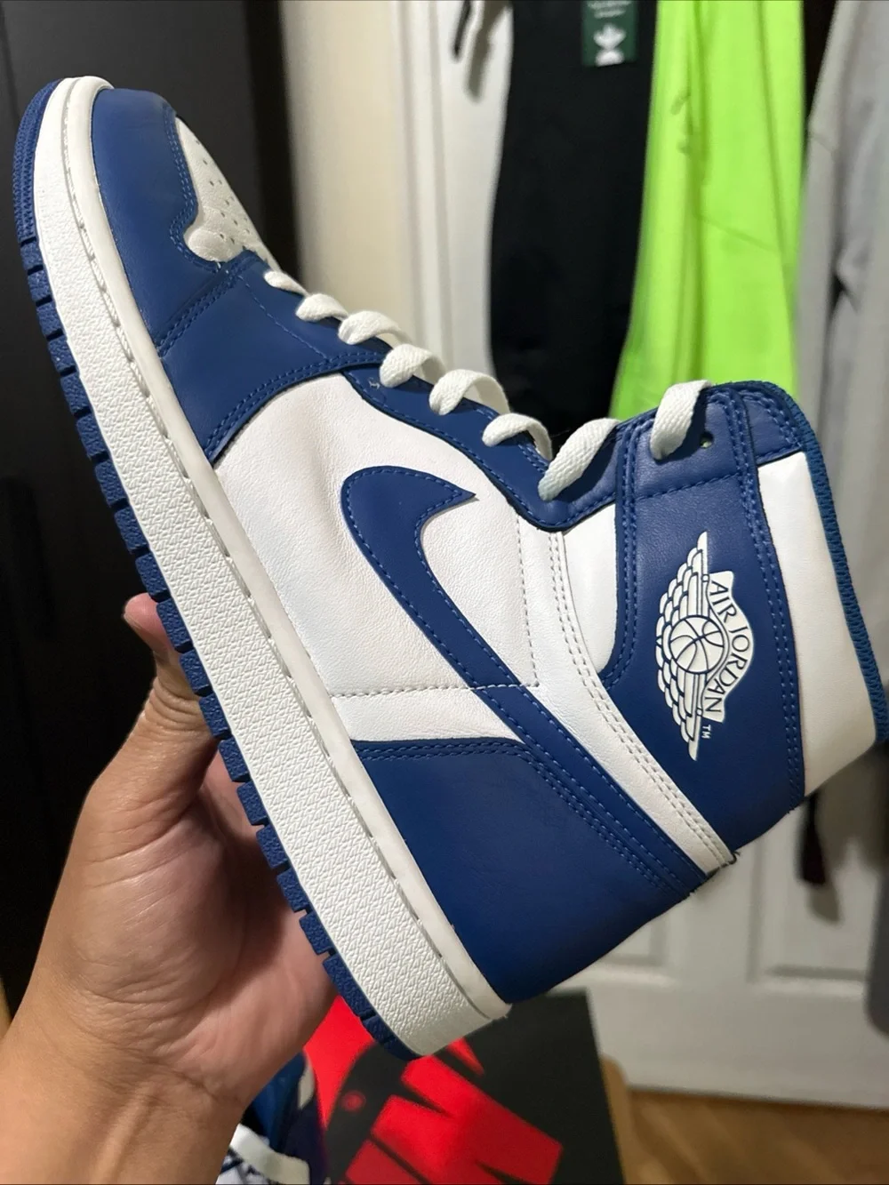 Jordan Air Jordan 1 Mid White and Blue Sneakers